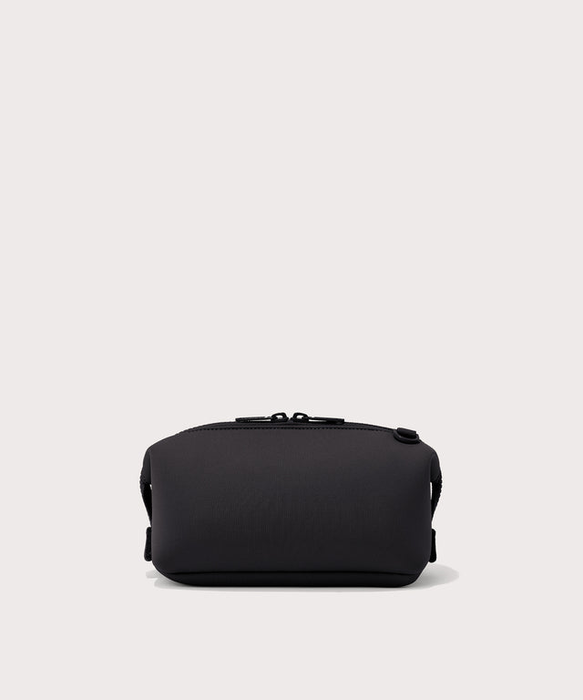 Dagne Dover Small Hunter Toiletry Bag in black seen from the back.
