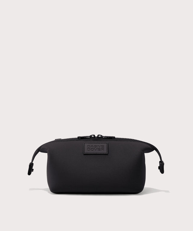 Dagne Dover Small Hunter Toiletry Bag in black with sides unclipped.
