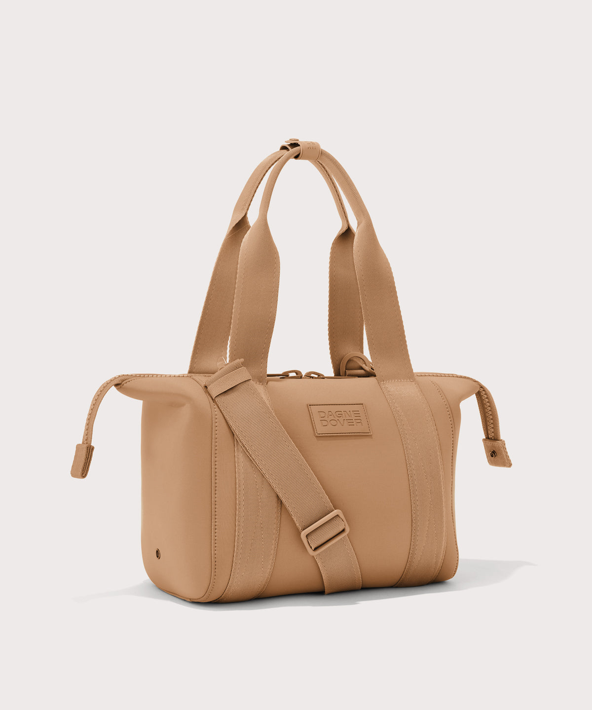 small Landon Carryall in brown camel with zippers unbuckled
