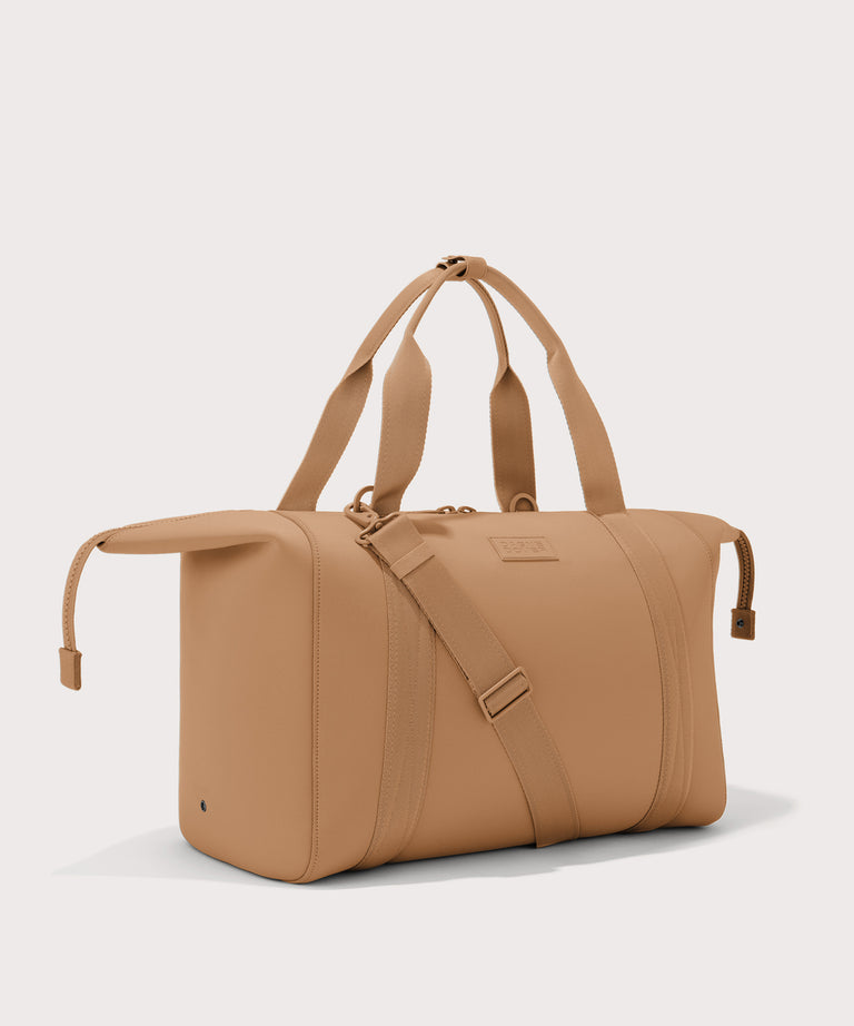 Extra large Landon Carryall in camel brown with zippers unbuckled
