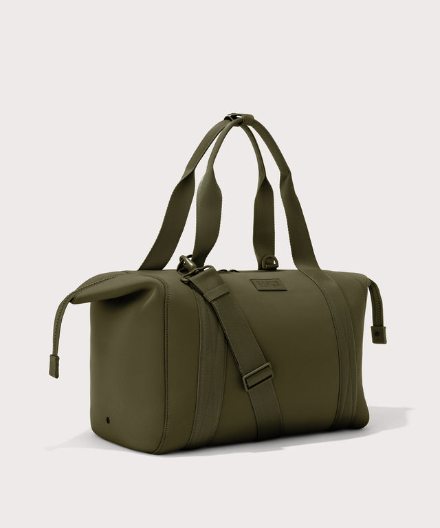 Large Landon Carryall in dark green with zippers unbuckled
