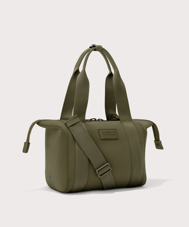 small Landon Carryall in dark green with zippers unbuckled
