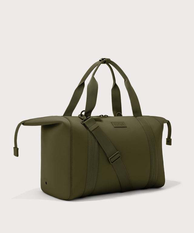 extra large Landon Carryall in dark green with zippers unbuckled
