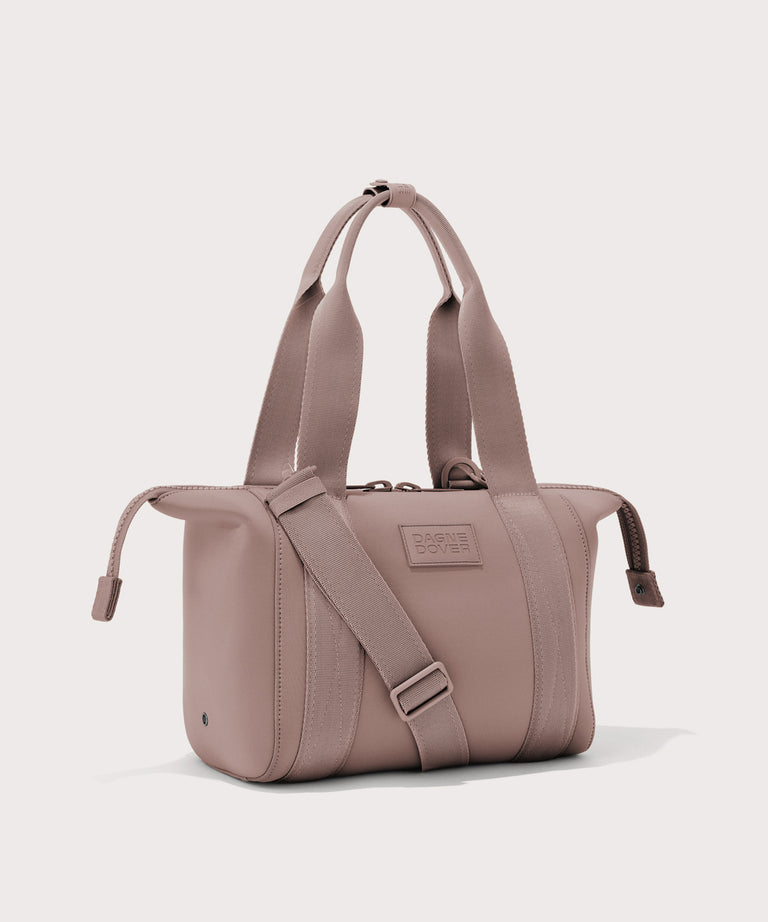 small Landon Carryall in pink with zippers unbuckled

