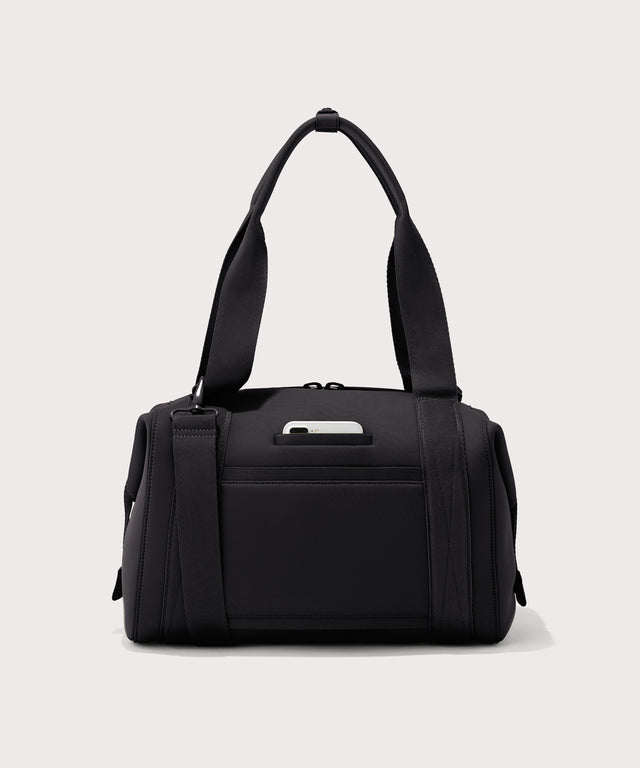 Large Landon Carryall in black, displaying an exterior phone pocket
