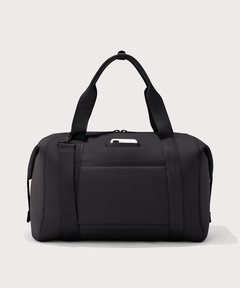 Extra large Landon Carryall in black, displaying an exterior phone pocket
