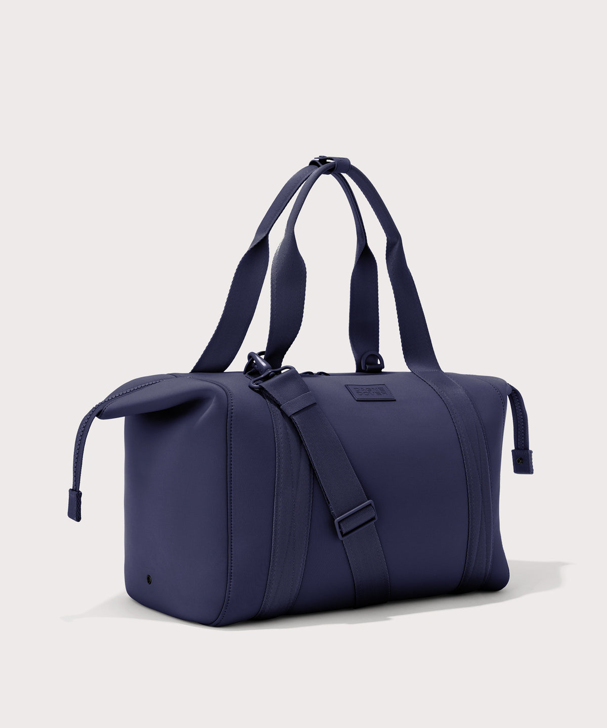 Large Landon Carryall in navy blue with zippers unbuckled
