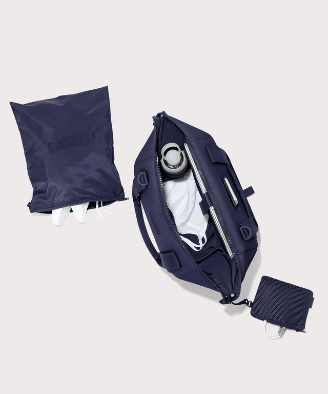 Large Landon Carryall in dark blue unzipped, top down view