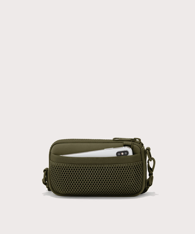 Dagne Dover Mara Phone Sling in dark green showing the exterior air mesh slip.
