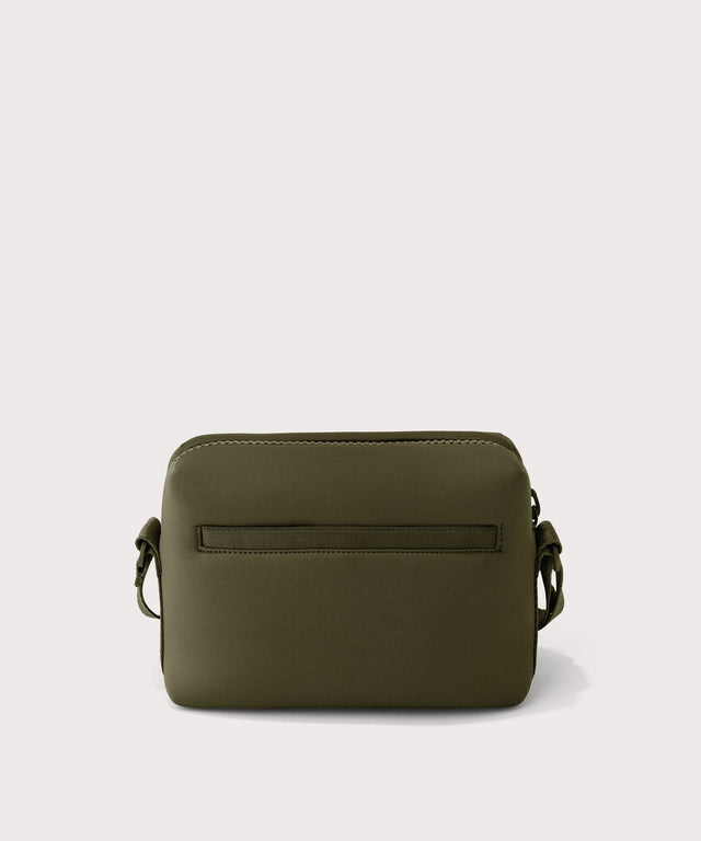 Dagne Dover Micah Crossbody in dark green seen from the back.
