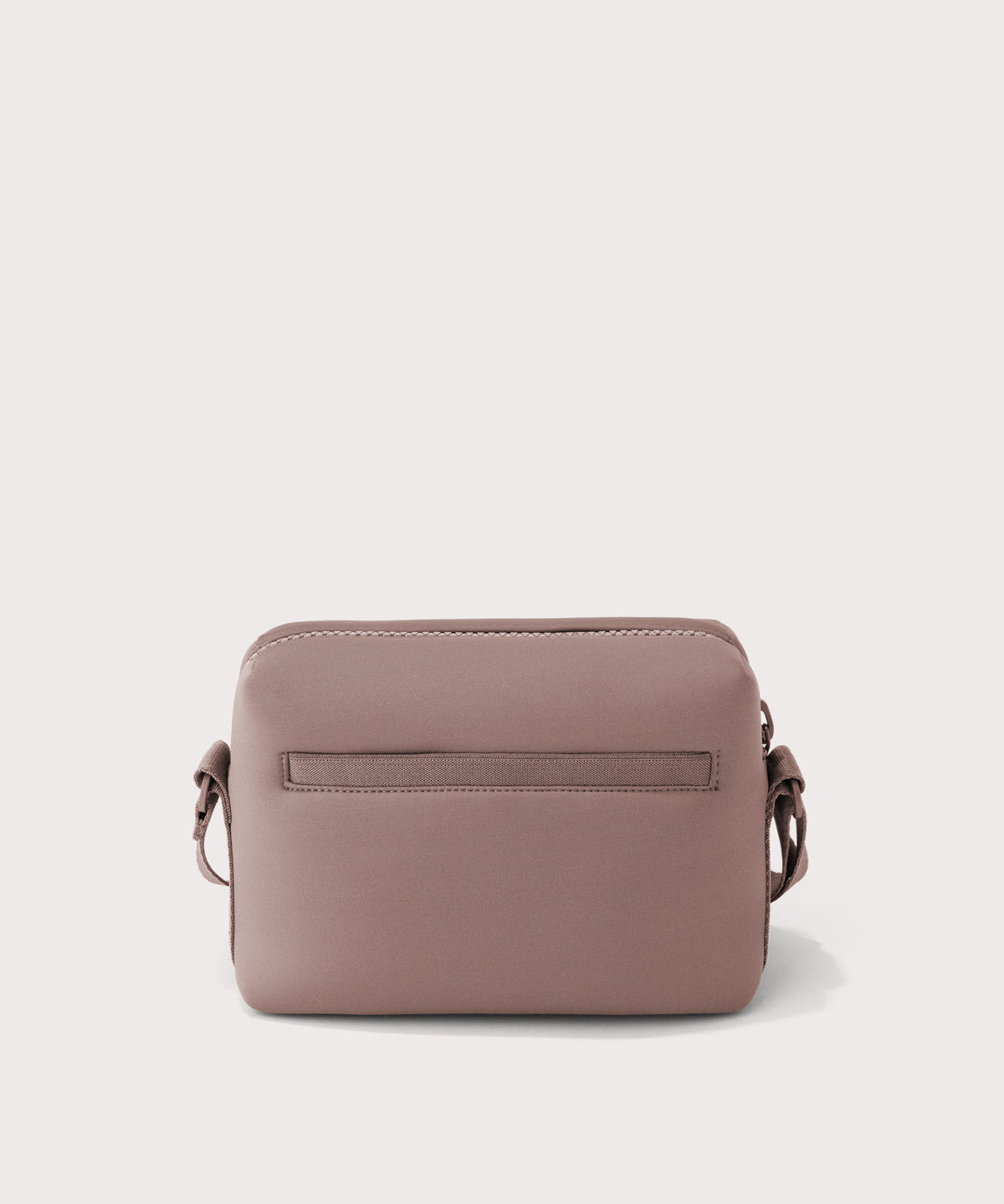Dagne Dover Micah Crossbody in pink seen from the back.
