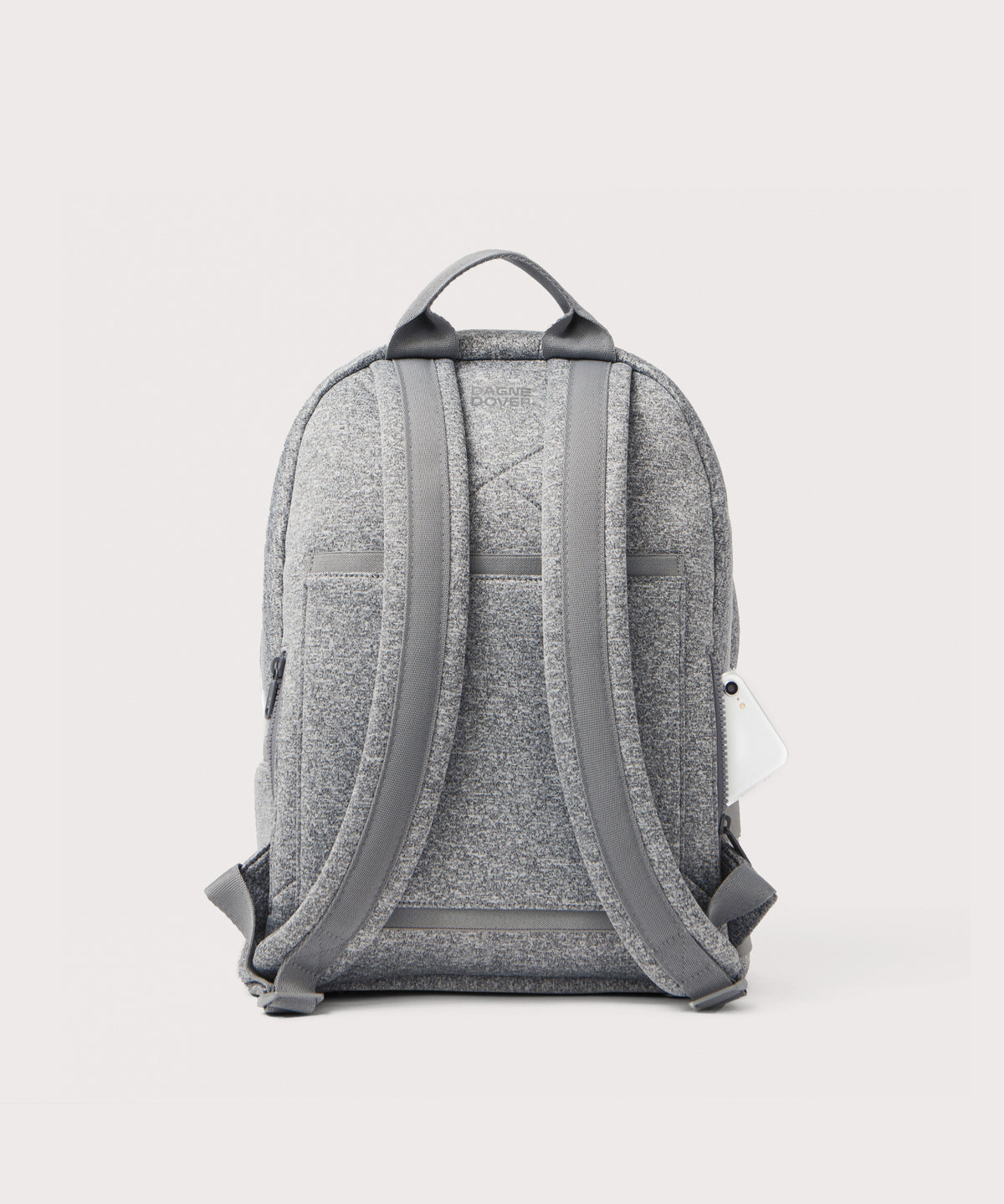Dagne Dover medium Dakota Neoprene Backpack in grey seen from the back.

