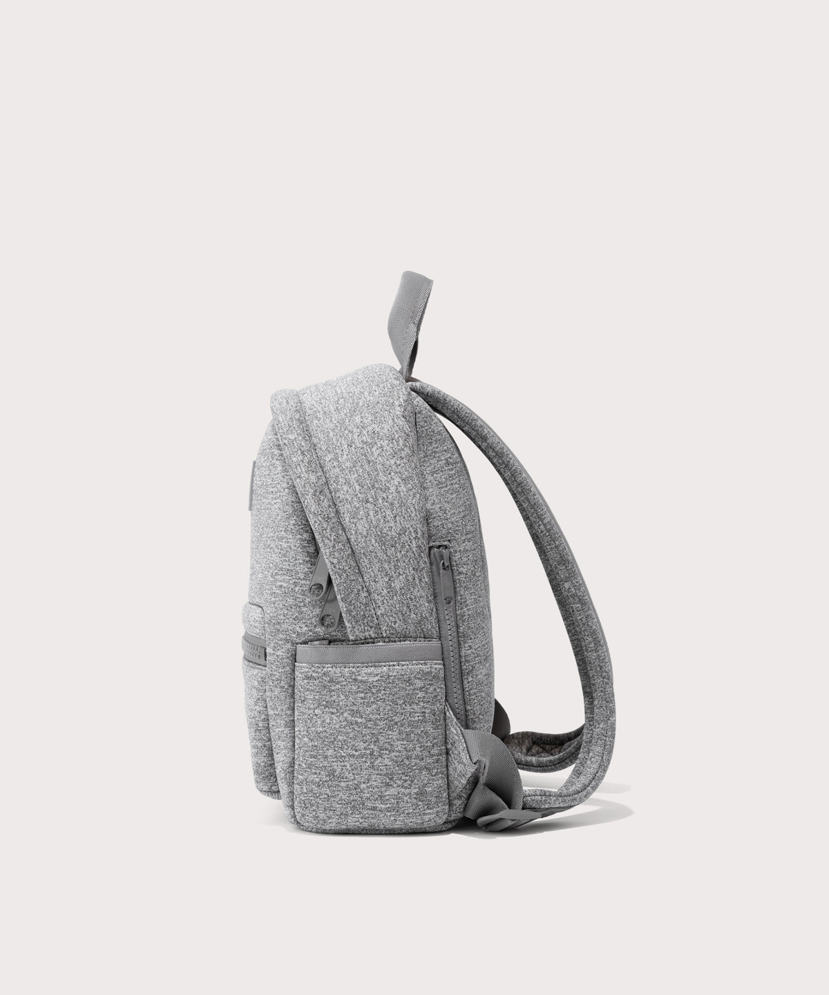 Dagne Dover small Dakota Neoprene Backpack in grey seen from the side.

