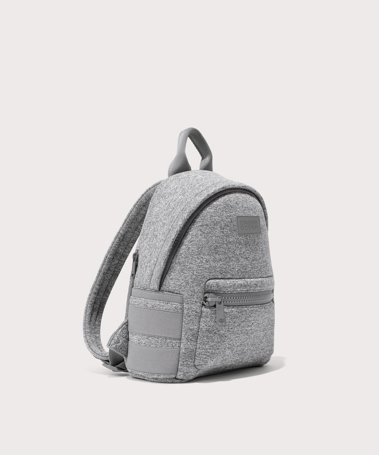 Dagne Dover small Dakota Neoprene Backpack in grey seen from an angle.
