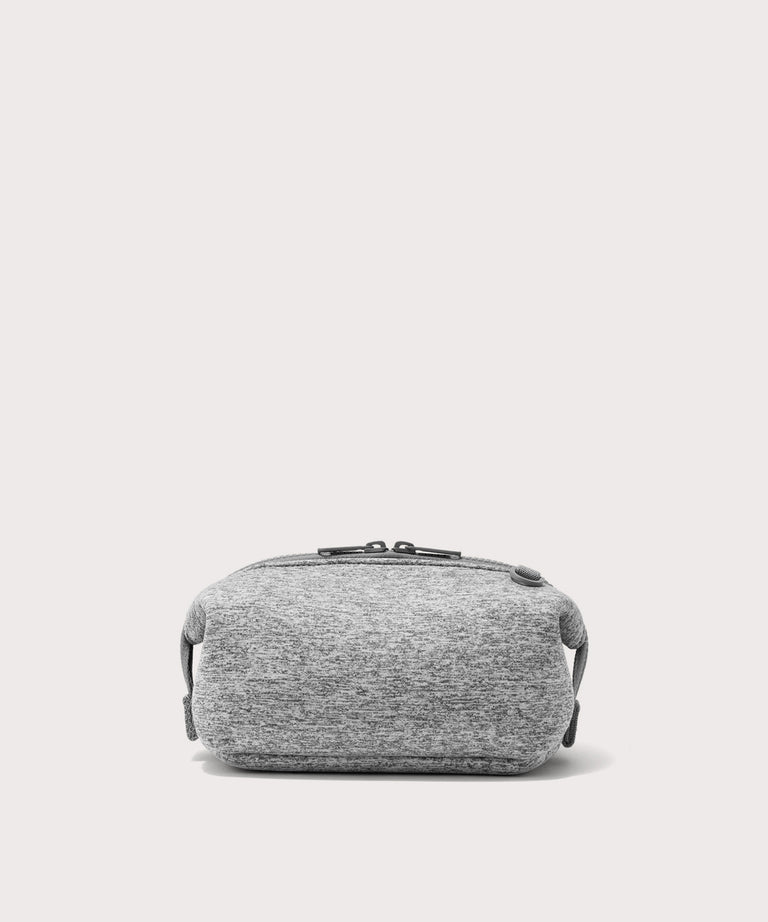 Dagne Dover Small Hunter Toiletry Bag in grey seen from the back.
