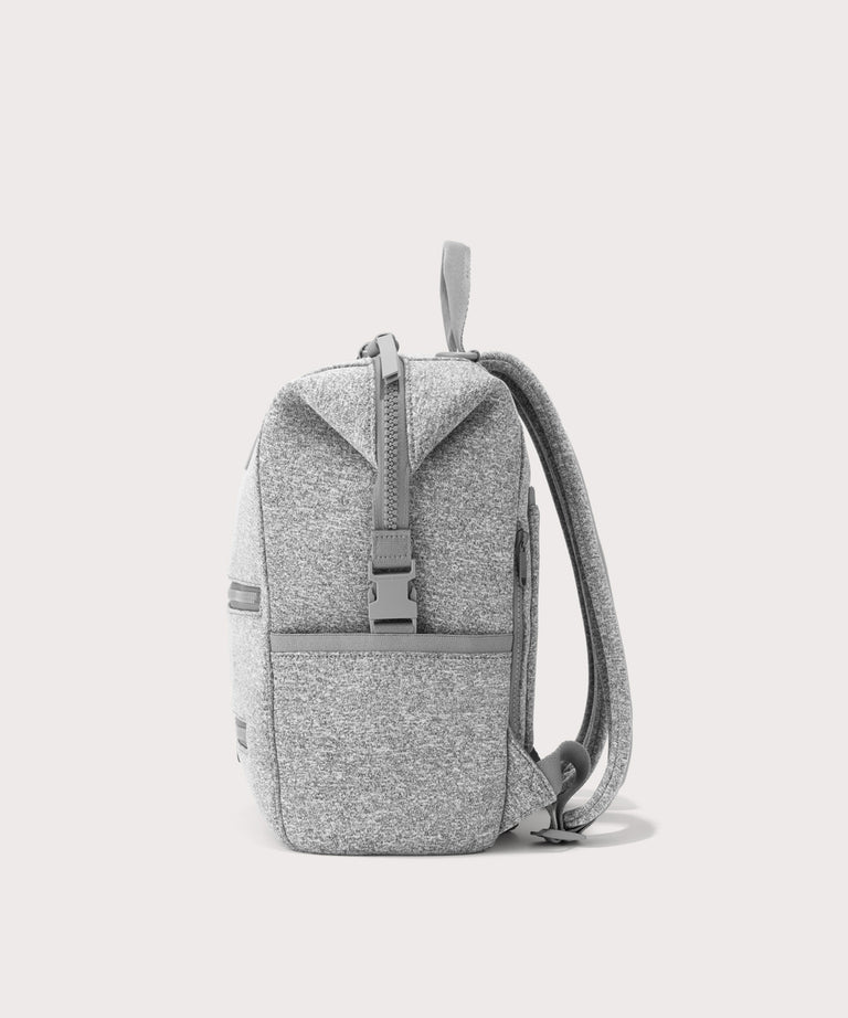 Dagne Dover medium Indi Diaper Backpack in grey seen from the side.
