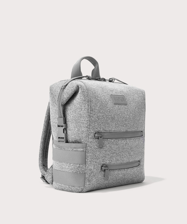 Dagne Dover medium Indi Diaper Backpack in grey seen from an angle.
