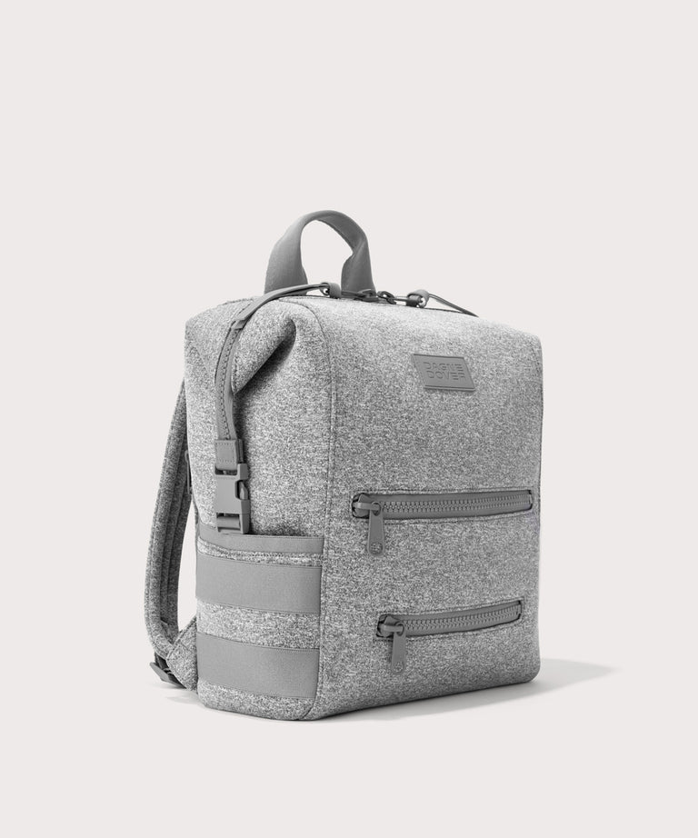 Dagne Dover medium Indi Diaper Backpack in grey seen from an angle.
