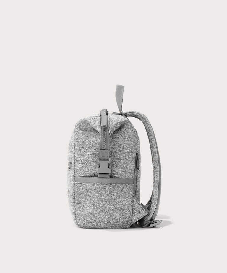 Dagne Dover small Indi Diaper Backpack in grey seen from the side.
