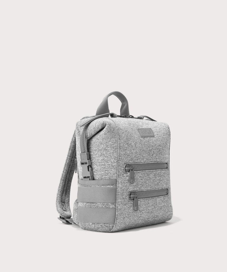 Dagne Dover small Indi Diaper Backpack in grey seen from an angle.
