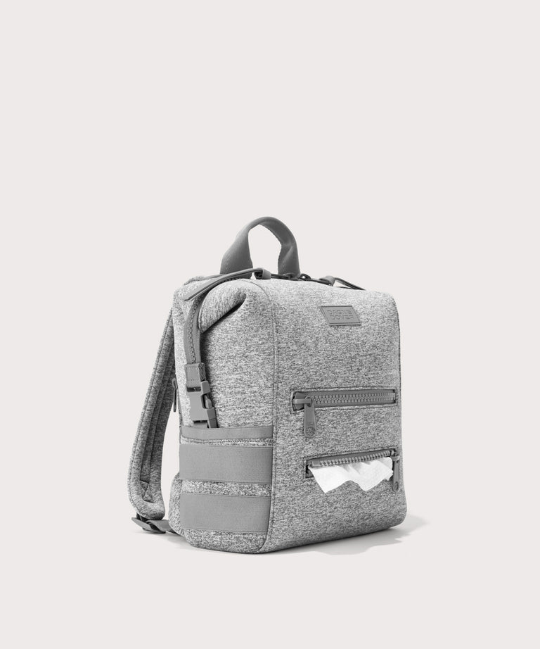 Dagne Dover small Indi Diaper Backpack in grey showing the zipper opening for easy access wipes.

