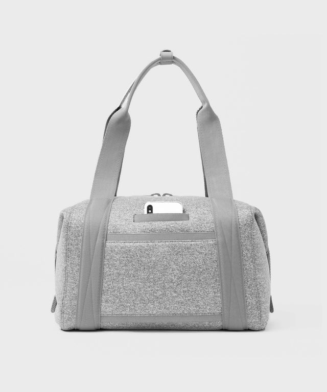 Large Landon Carryall in grey, displaying an exterior phone pocket
