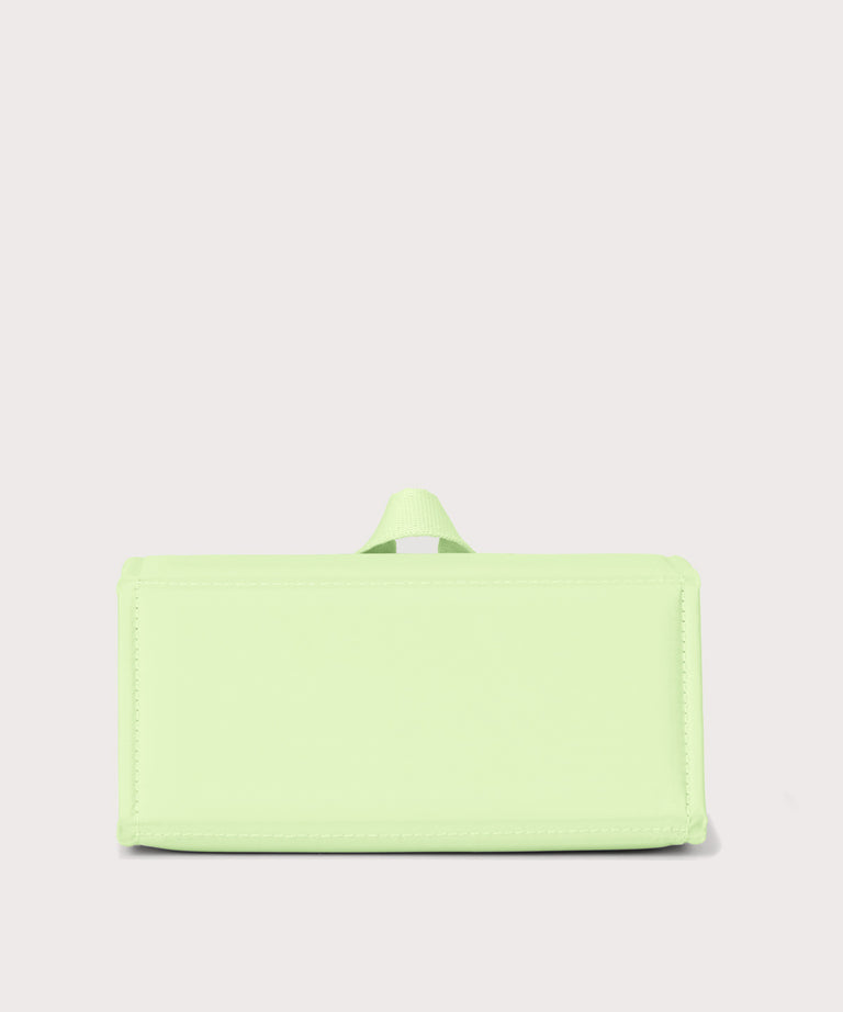 Dagne Dover Remi foldable glasses holder in matcha green seen from the back.
