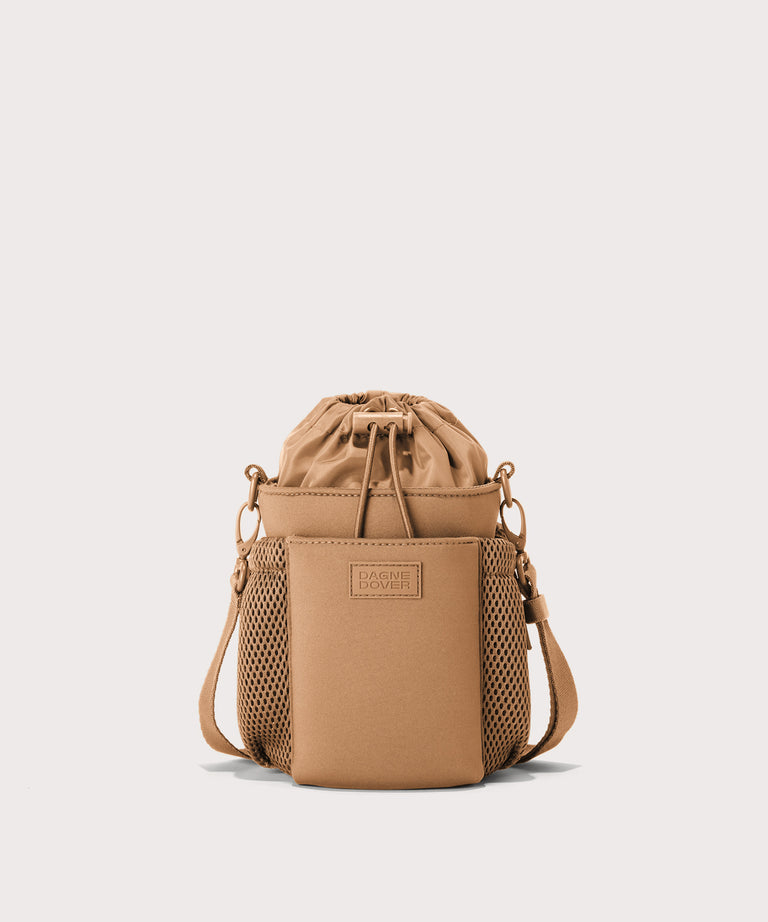 Dagne Dover Sloan Water Bottle Sling in camel brown.
