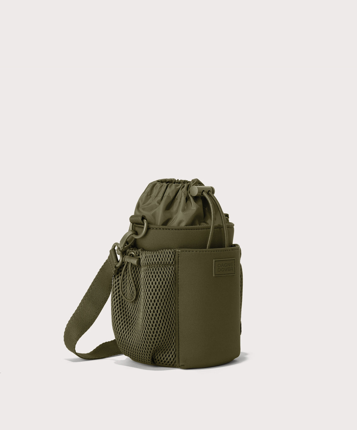 Dagne Dover Sloan Water Bottle Sling in dark green seen from an angle.
