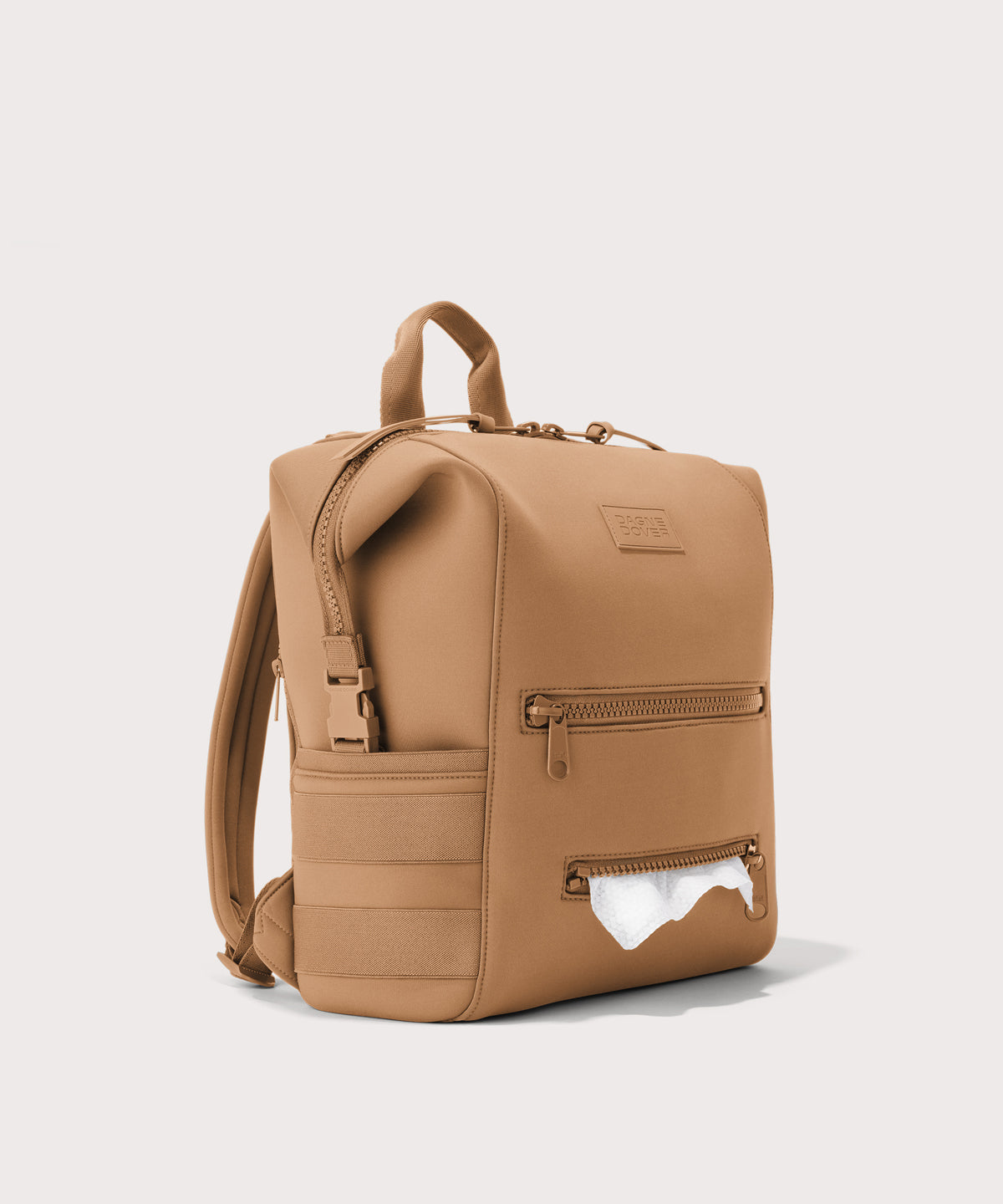 Dagne Dover Medium Indi Diaper Backpack in camel brown showing the zipper opening for easy access wipes.

