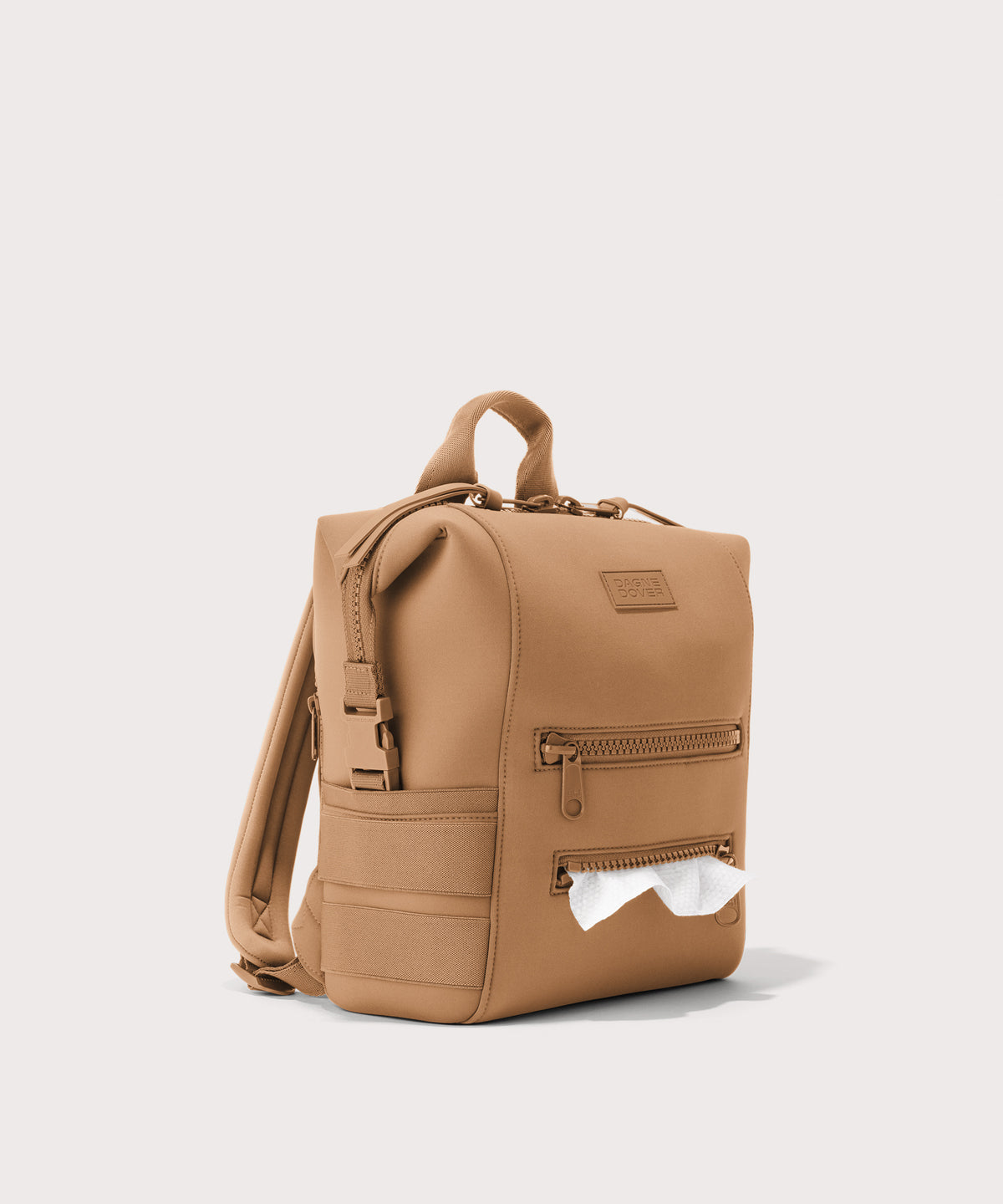 Dagne Dover small Indi Diaper Backpack in camel brown showing the zipper opening for easy access wipes.