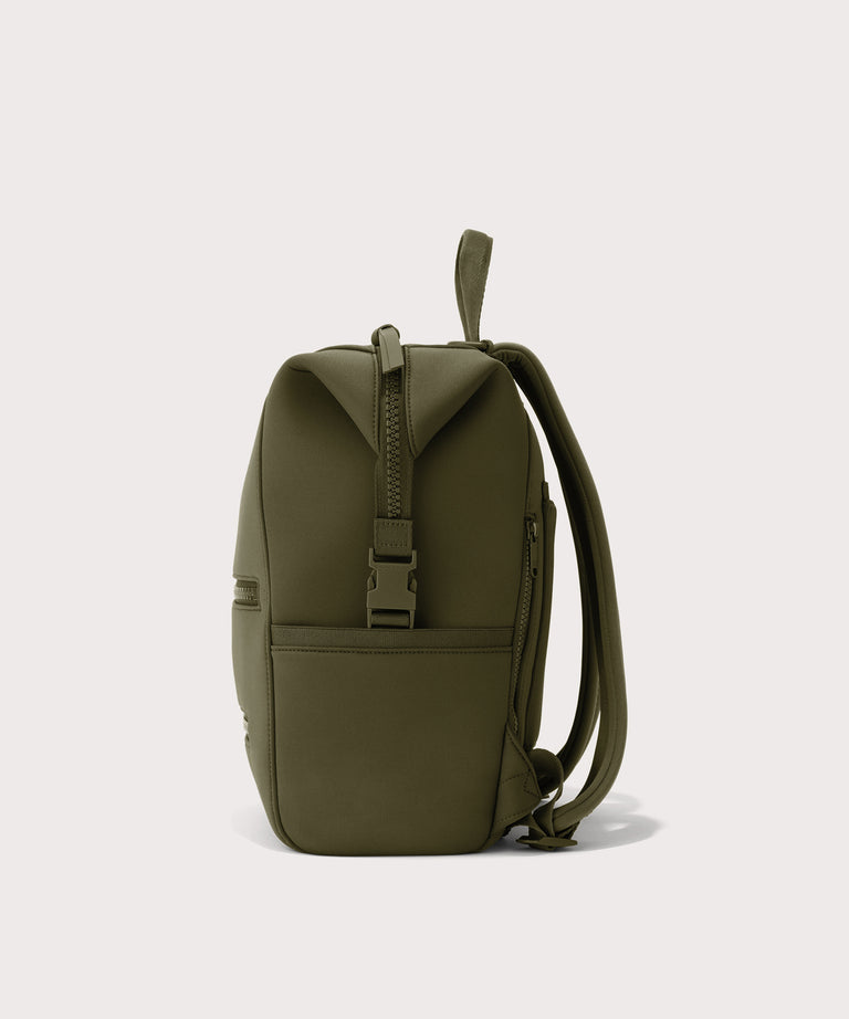Dagne Dover medium Indi Diaper Backpack in dark moss seen from the side.

