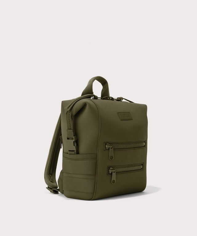 Dagne Dover small Indi Diaper Backpack in dark moss seen from an angle.
