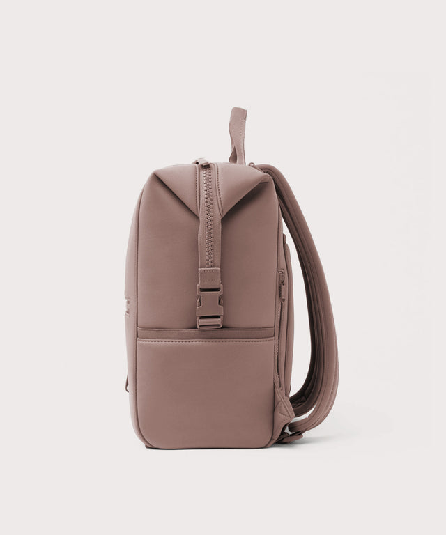 Dagne Dover Large Indi Diaper Backpack in pink seen from the side.
