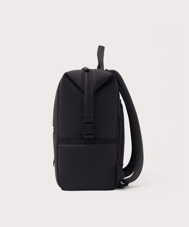 Dagne Dover Large Indi Diaper Backpack in onyx seen from the side.
