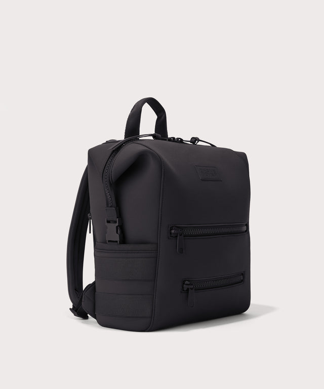 Dagne Dover medium Indi Diaper Backpack in black seen from an angle.
