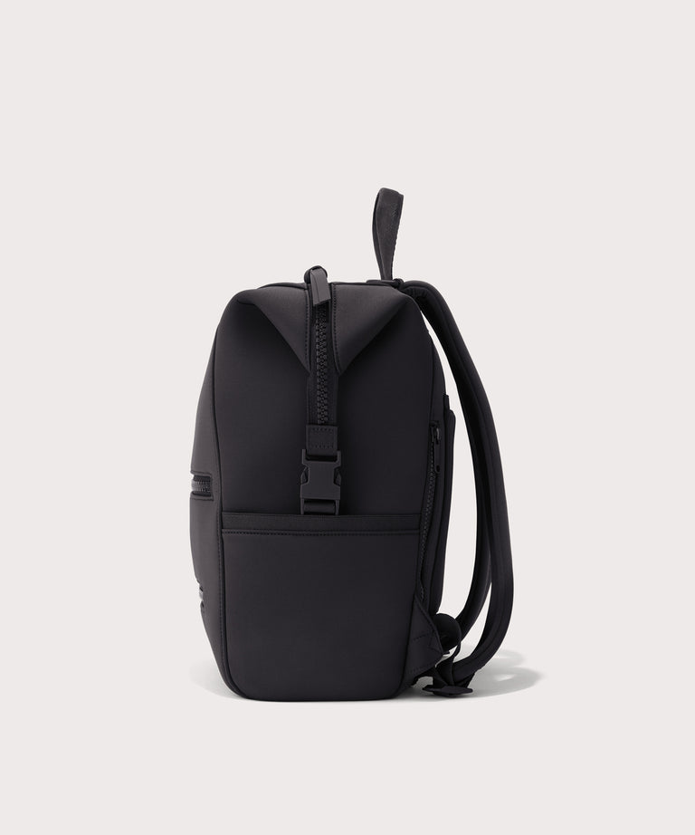 Dagne Dover medium Indi Diaper Backpack in black seen from the side.
