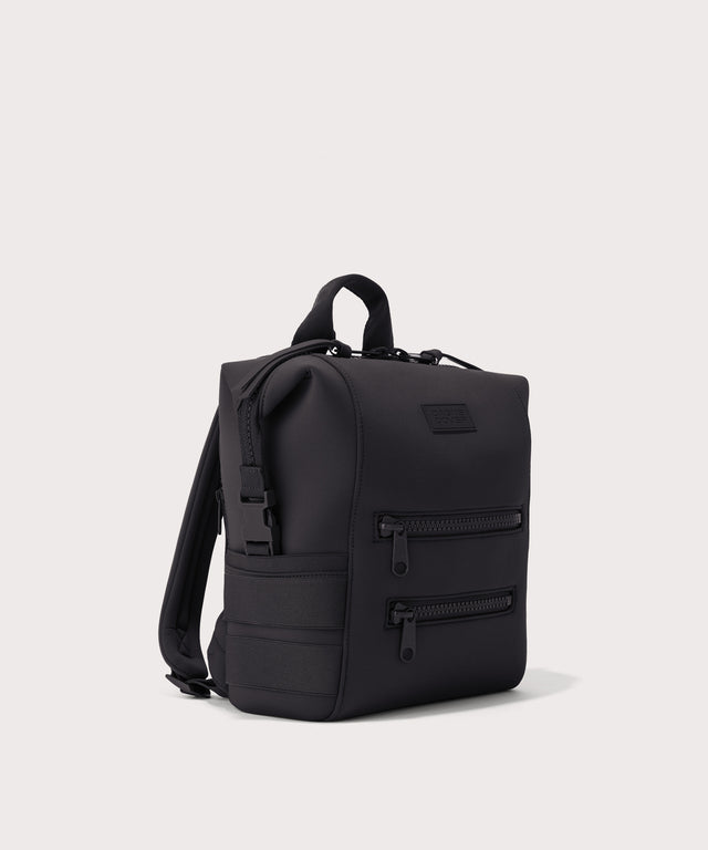 Dagne Dover small Indi Diaper Backpack in black seen from an angle.
