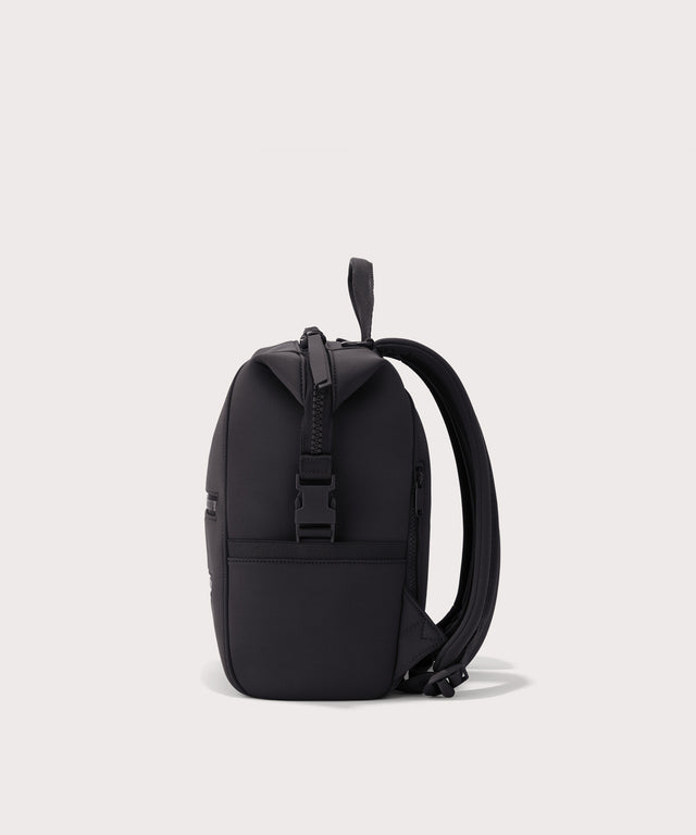 Dagne Dover small Indi Diaper Backpack in black seen from the side.
