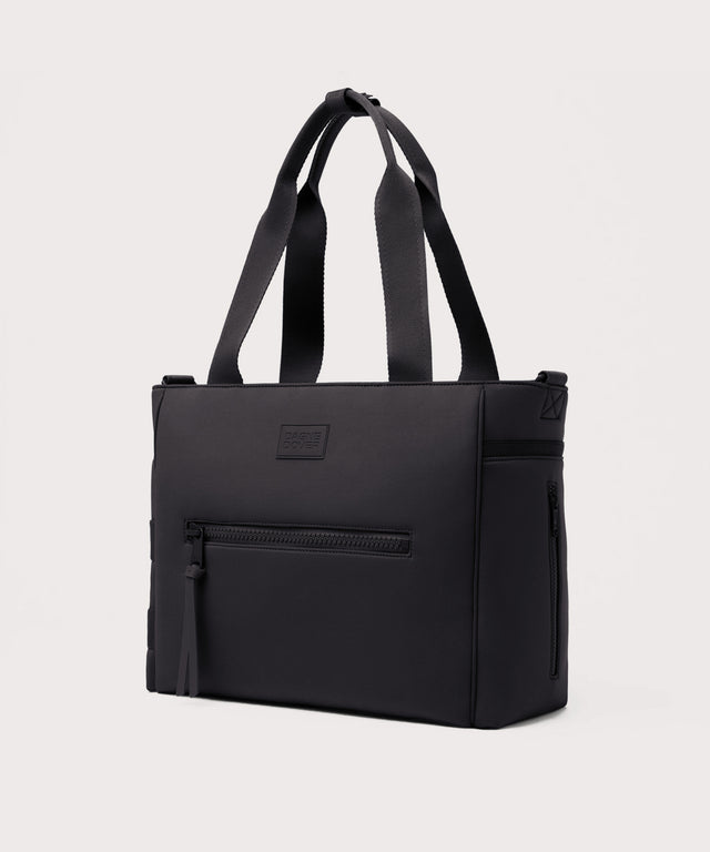 Dagne Dover large Wade Diaper Tote in black seen from an angle.
