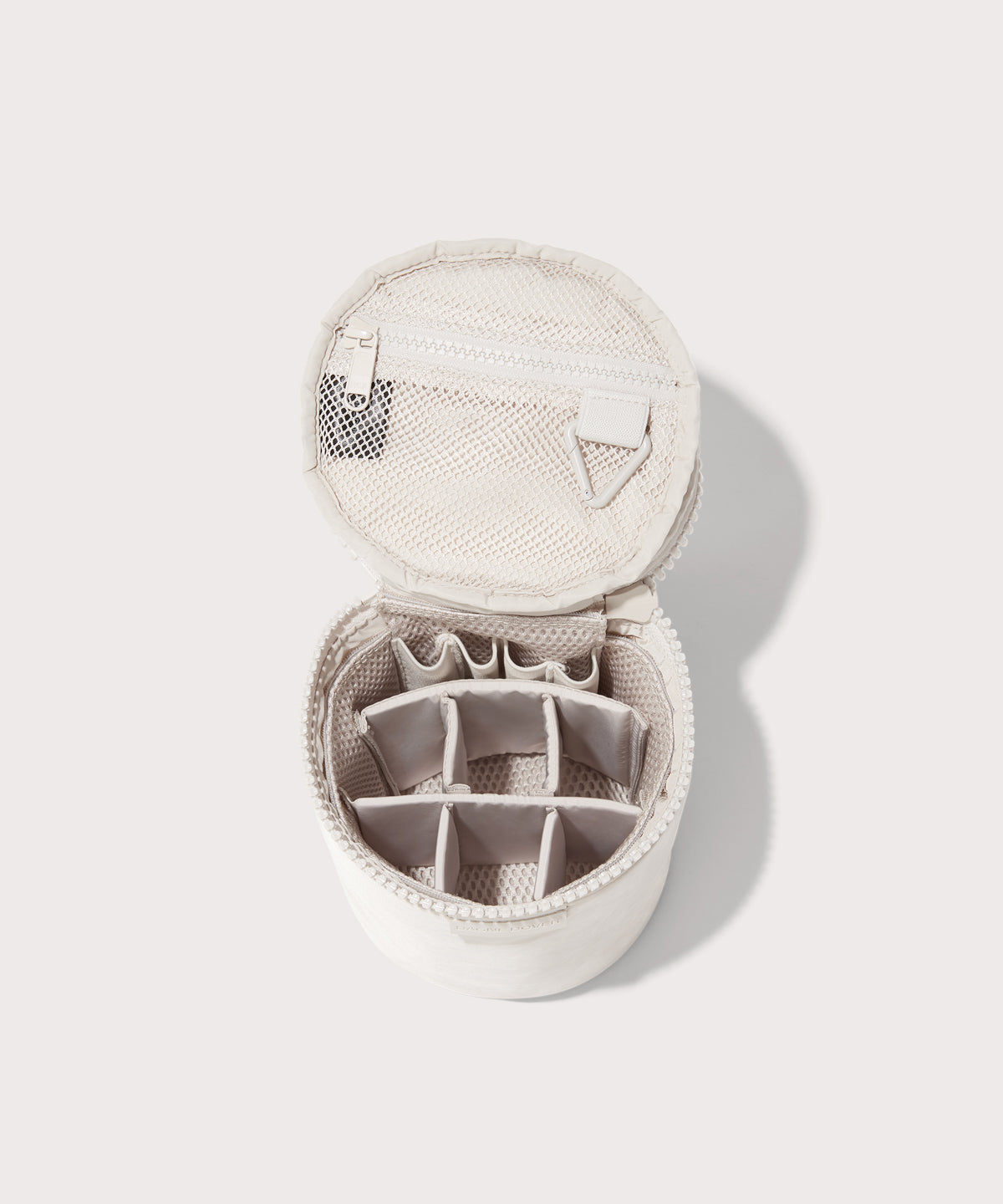 Dagne Dover large Mila Toiletry Pouch in white unzipped with the 6 adjustable compartments.
