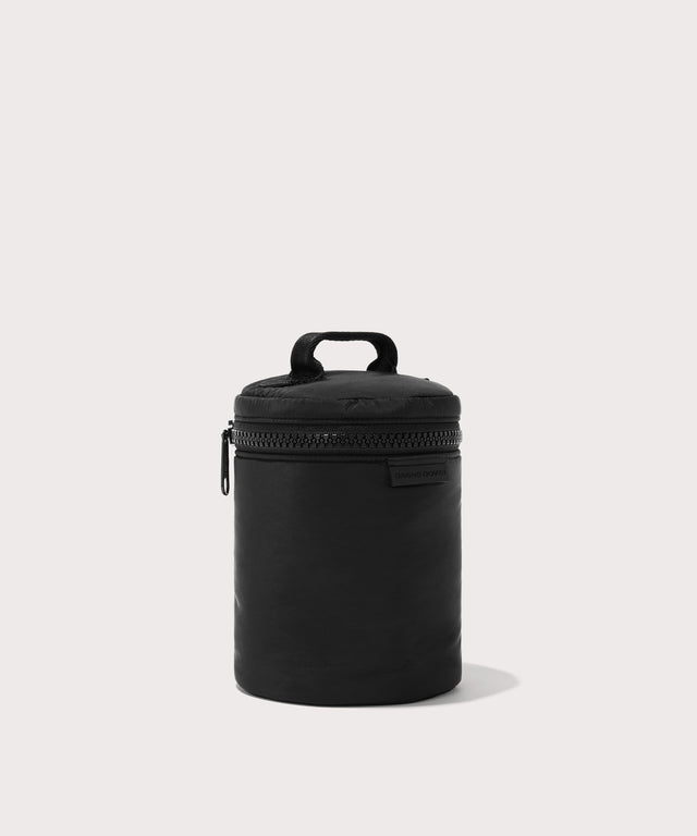 Dagne Dover large Mila Toiletry Pouch in black seen from an angle.
