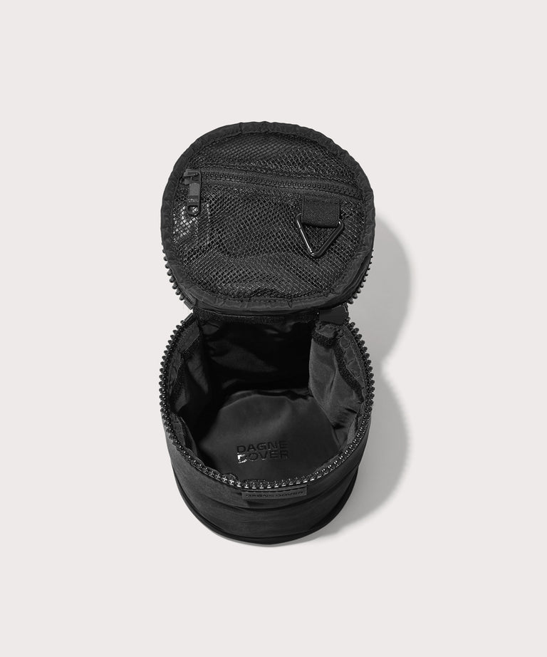 Dagne Dover large Mila Toiletry Pouch in black unzipped.
