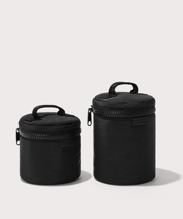 Dagne Dover small and large Mila Toiletry Pouches in black.
