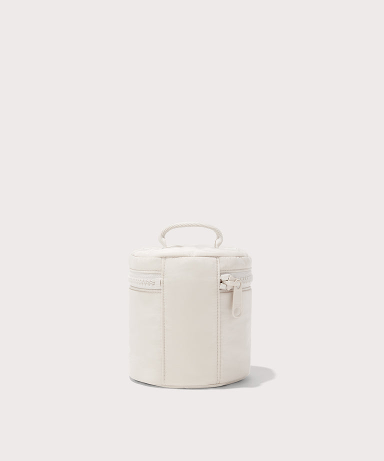 Dagne Dover small Mila Toiletry Pouch in white seen from the back.
