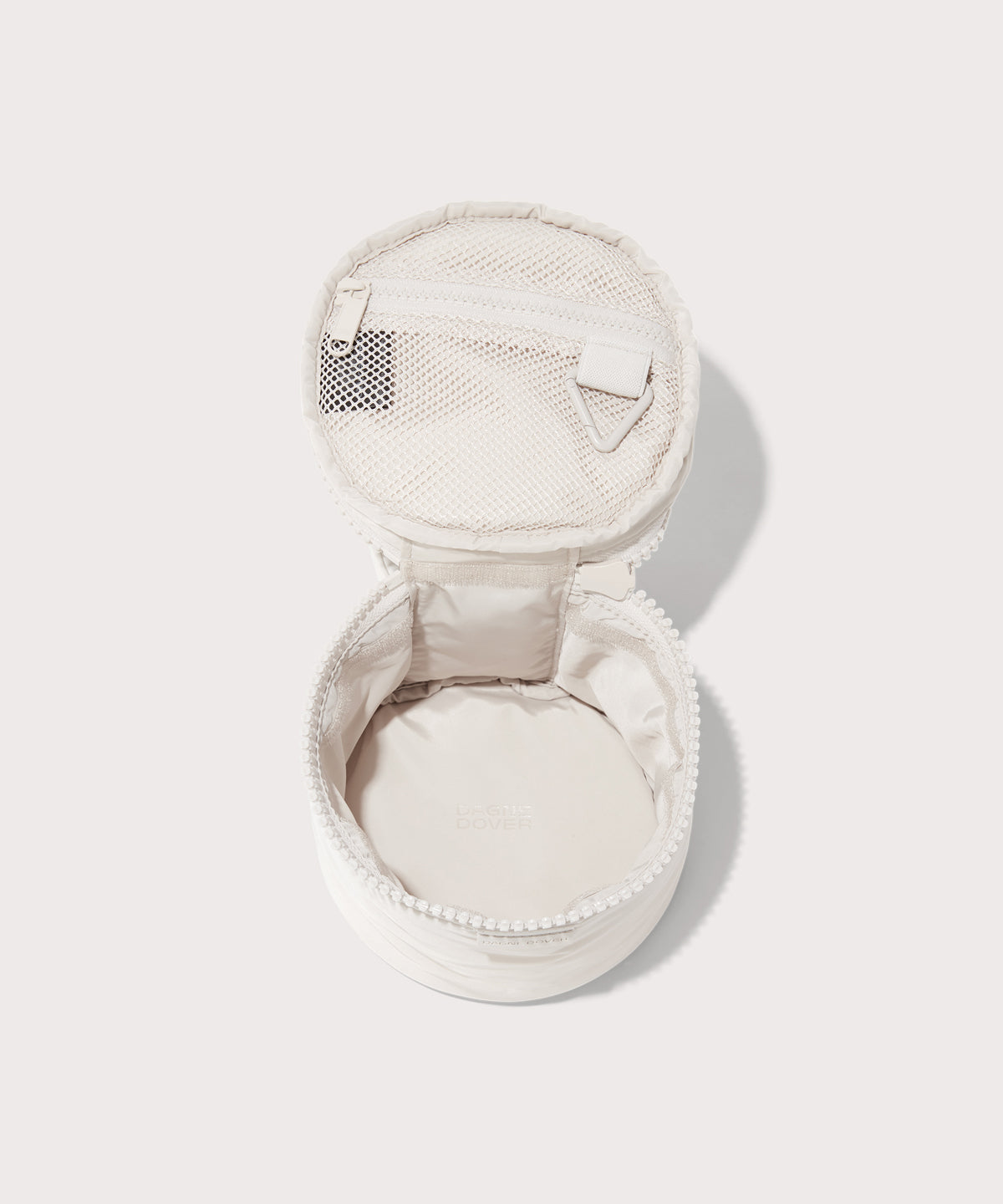 Dagne Dover small Mila Toiletry Pouch in white unzipped.
