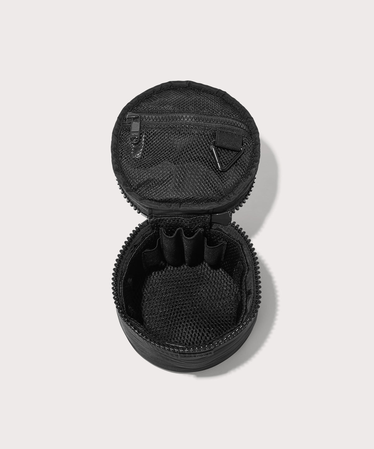 Dagne Dover small Mila Toiletry Pouch in black unzipped with the removable airmesh insert.
