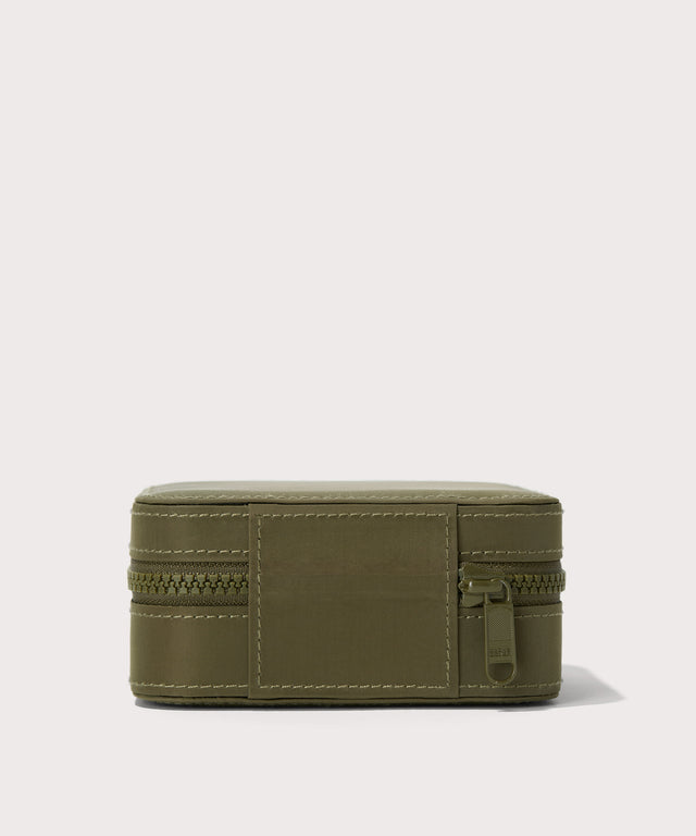 Dagne Dover Large Frankie Jewelry Case in dark green seen from the back.
