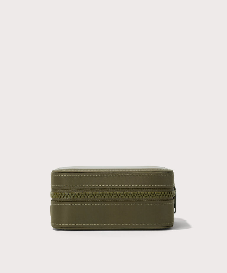 Dagne Dover Large Frankie Jewelry Case in dark green seen from a side.
