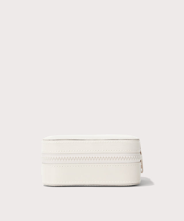 Dagne Dover Large Frankie Jewelry Case in white seen from a side.
